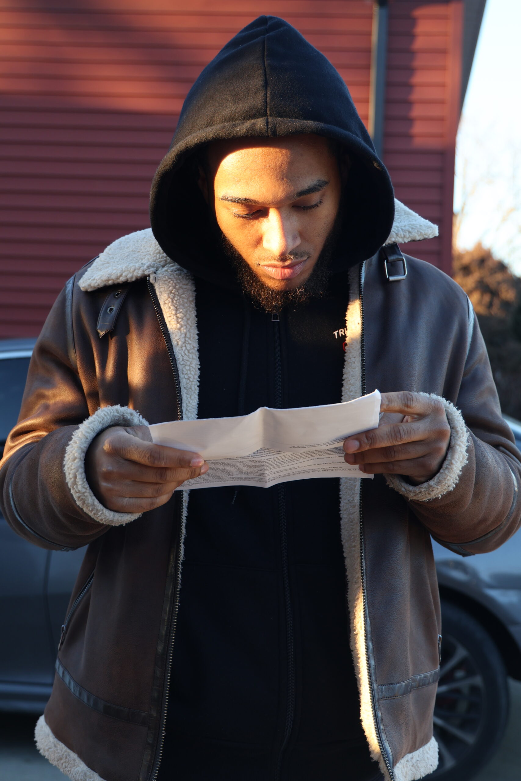 Man reading outdoors photographed by LAL ST
